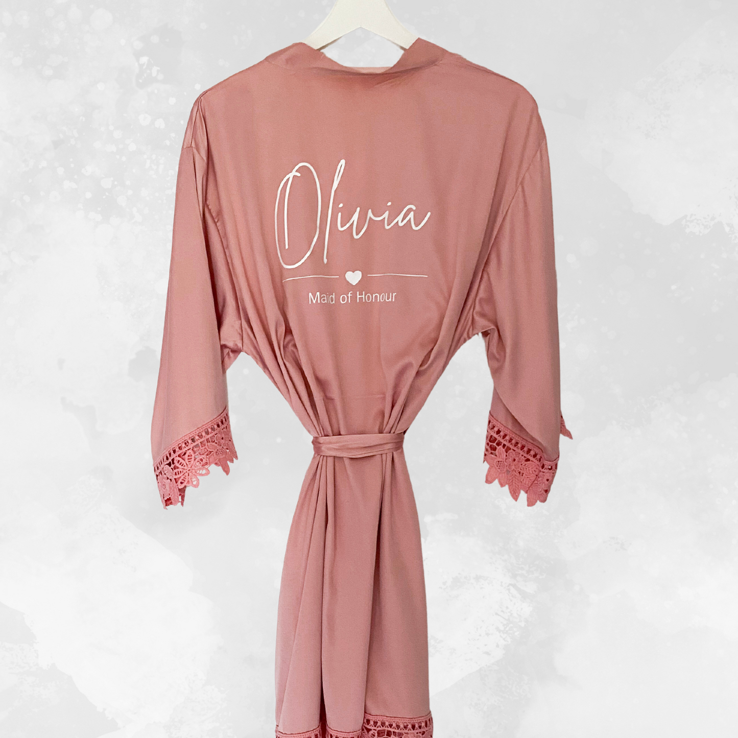 matching pink robes for bridesmaid with name on the back