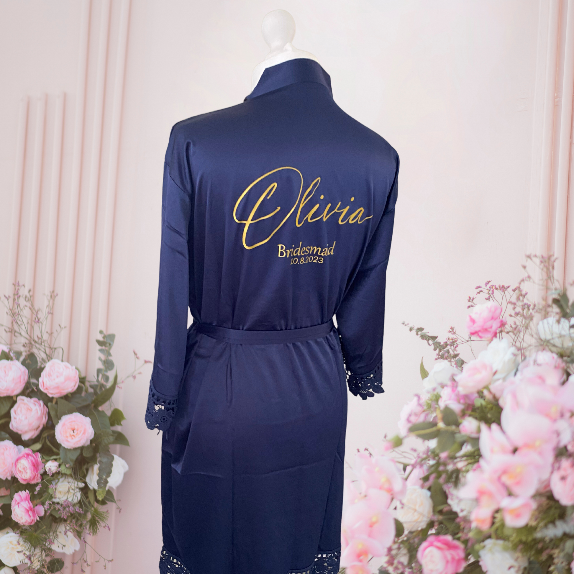 personalised satin robe for bridal party. navy blue with name and date on the back